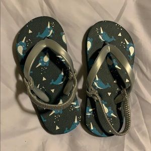 4/$10 narwhal print blue flip flops, nwot.
